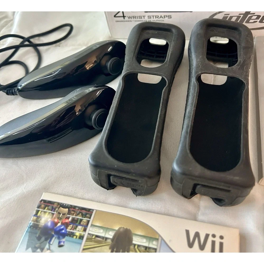 Nintendo Wii Sports - Bundle- With Intec 15-in-1 Controls and Accessories